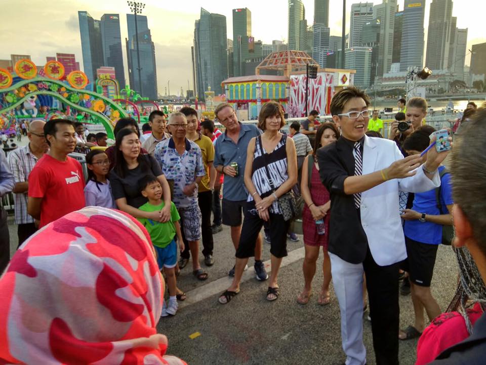 Mr Bottle performing close up magic at River Hongbao 2018