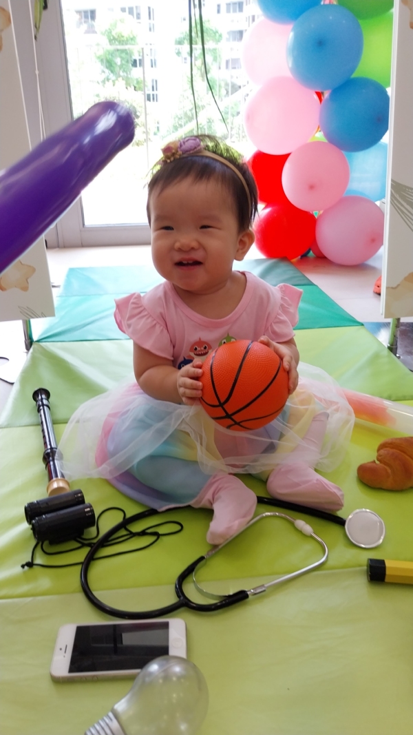 A baby doing a choosing ceremony